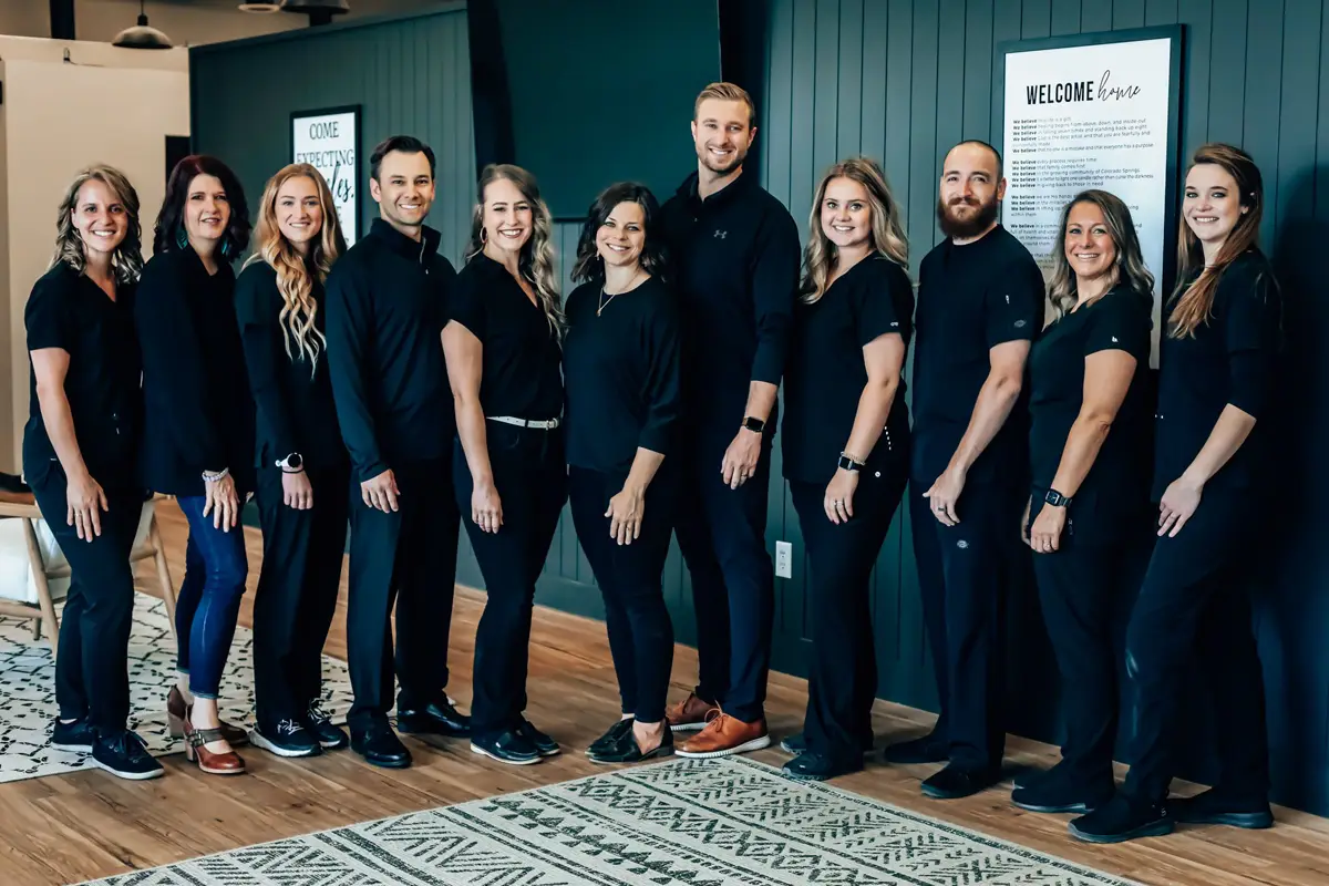 Chiropractor Colorado Springs CO Joshua Logan And Taylor Logan With Team Chiropractor Colorado Springs CO Joshua Logan And Taylor Logan With Team